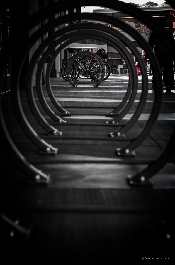 Receding circular bike racks with a touch of red